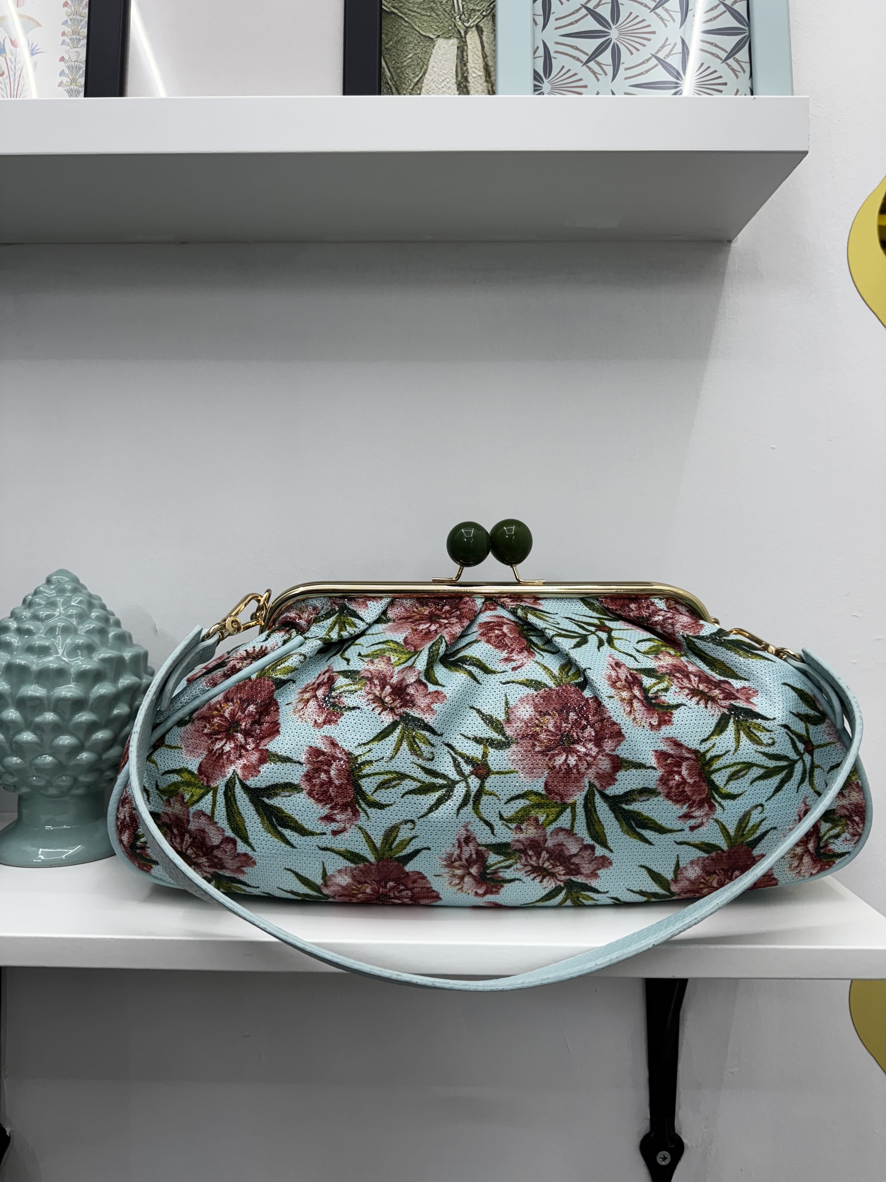 Borsa clutch con paillettes e motivo a fiori
