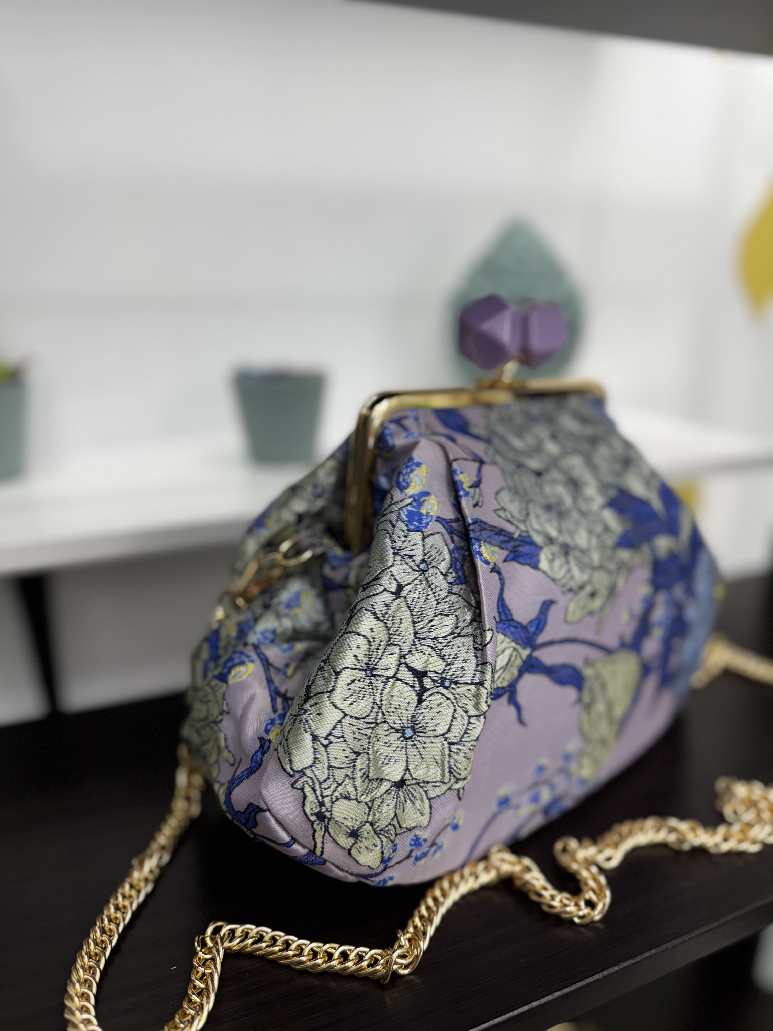 Borsa clutch in tessuto jacquard con fiori