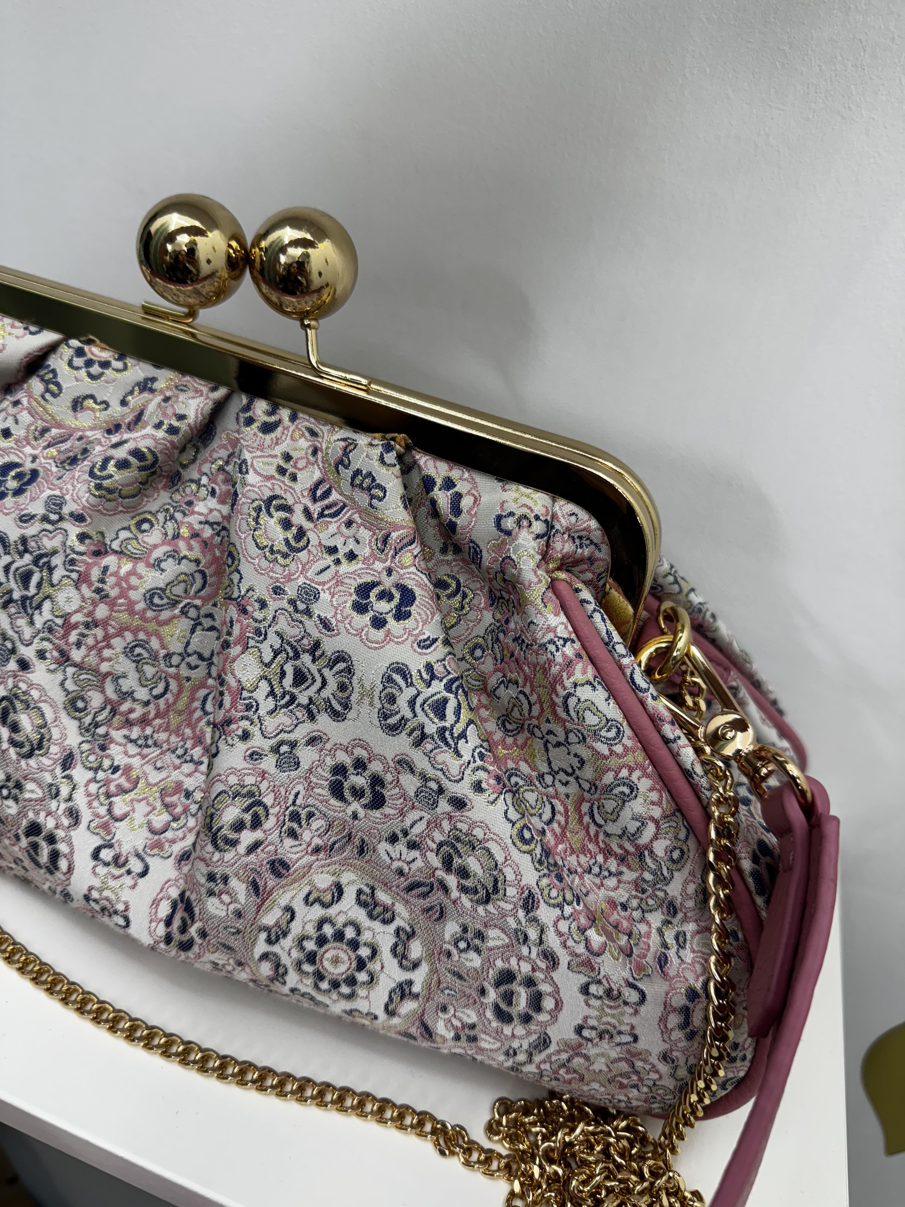 Borsa clutch in jaquard con motivo floreale