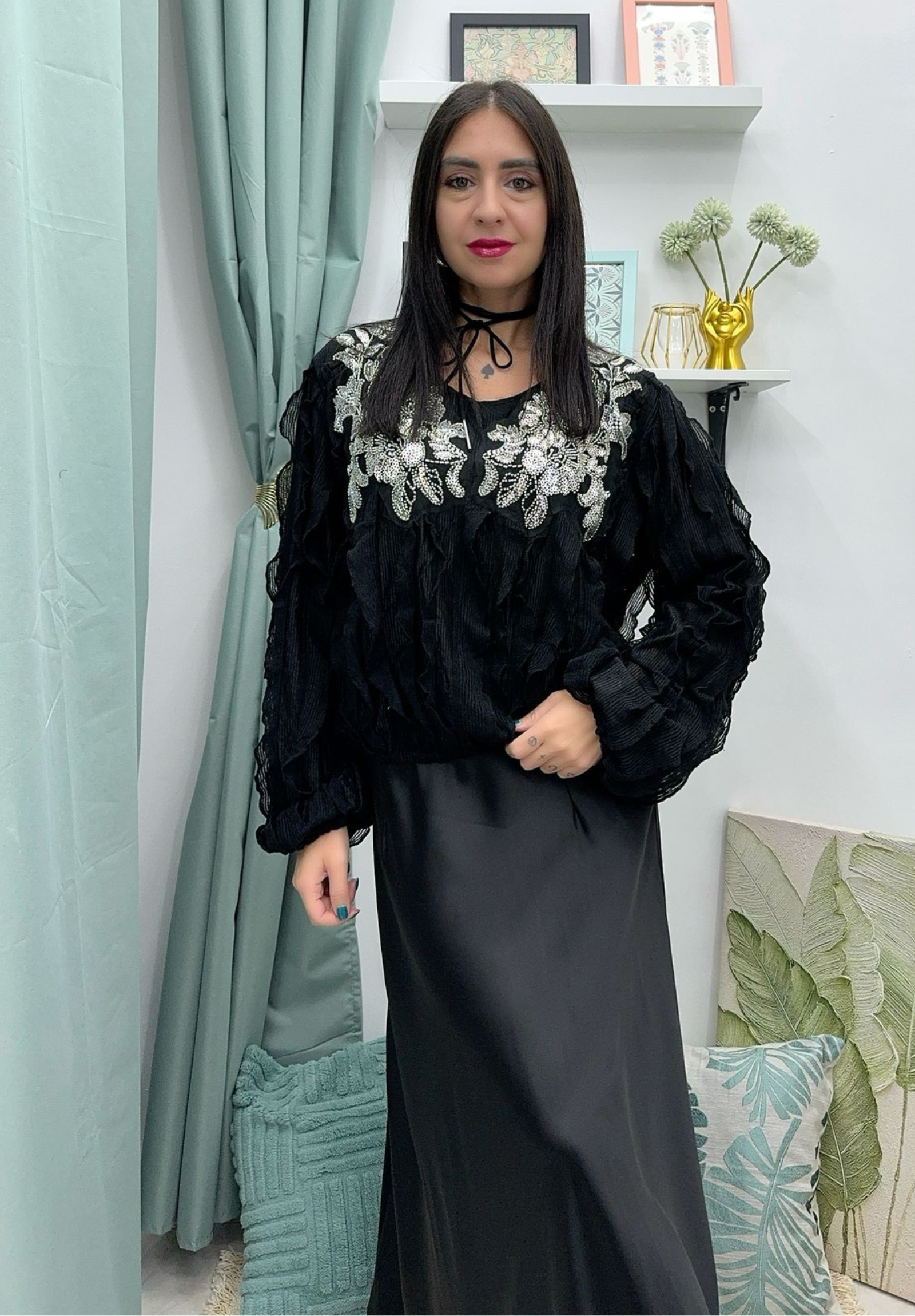 Maglia con volant e paillettes