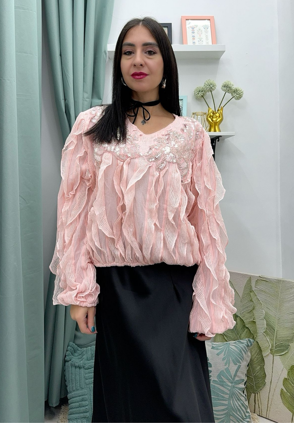 Maglia con volant e paillettes