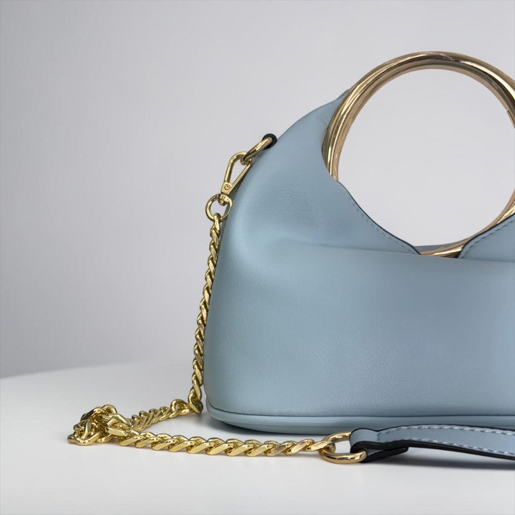Borsa a Mano "Glam Ring" con Tracolla a Catena – Eleganza Contemporanea