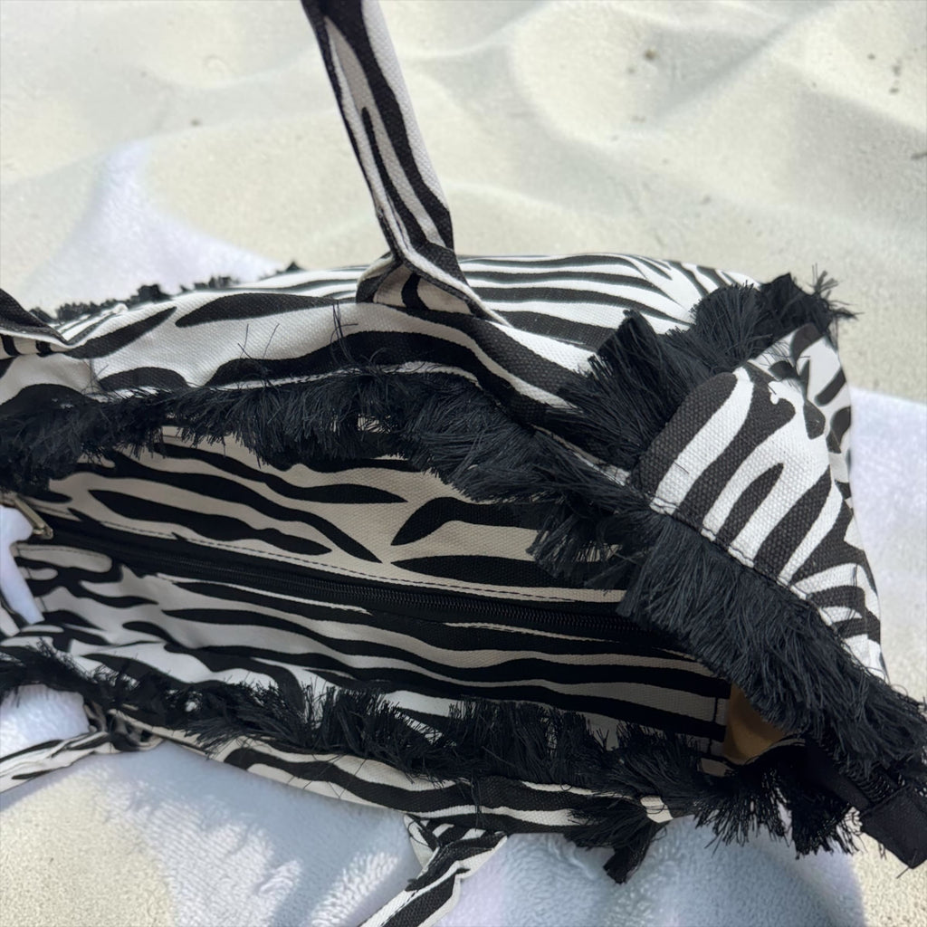 Borsa in Tela Animalier con Frange e Cerniera - Modello Zebrato e Leopardato