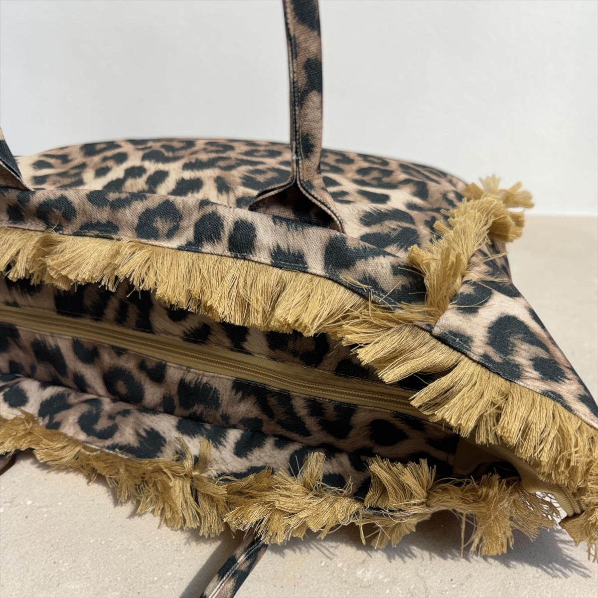 Borsa in Tela Animalier con Frange e Cerniera - Modello Zebrato e Leopardato