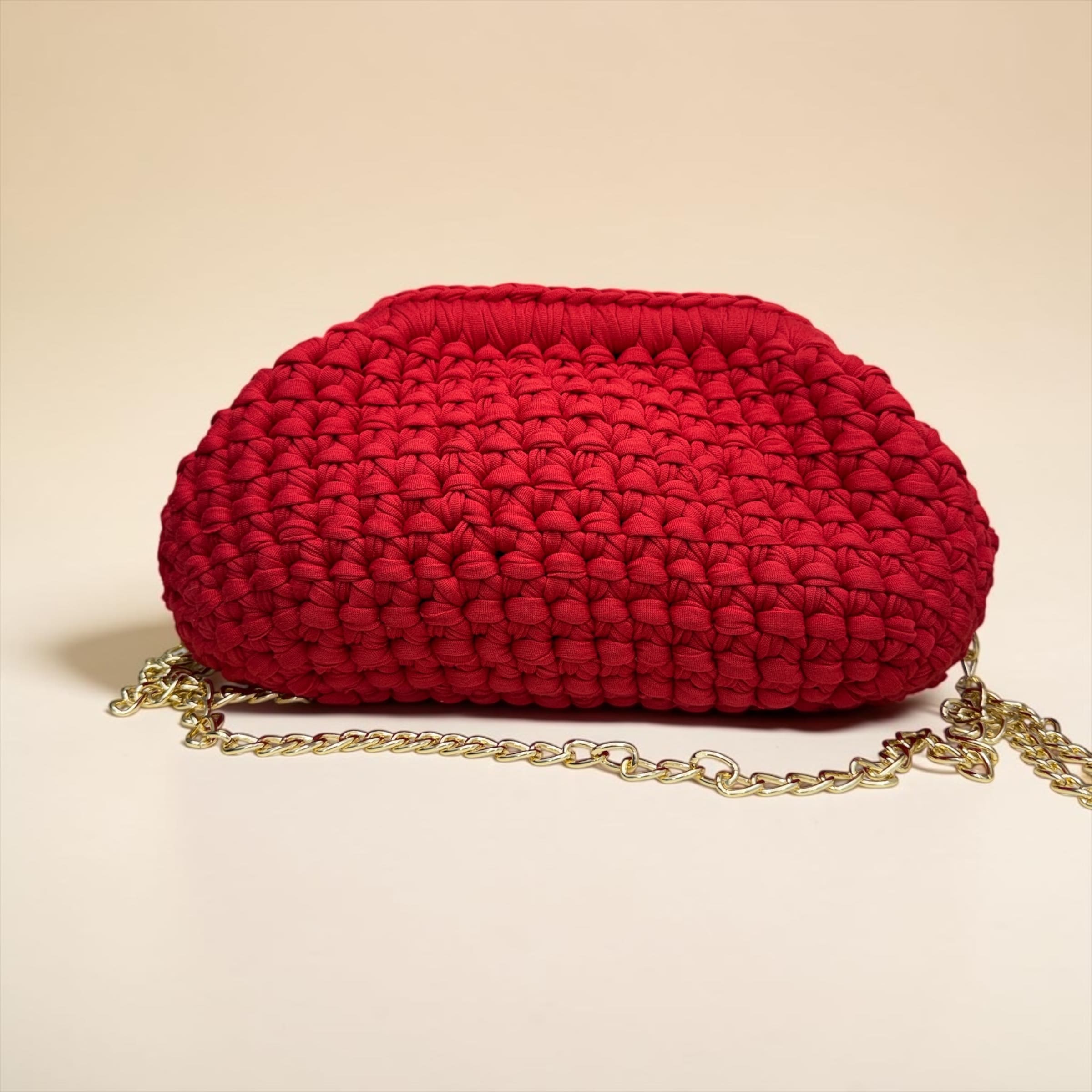 Borsa clutch in fettuccia ad uncinetto