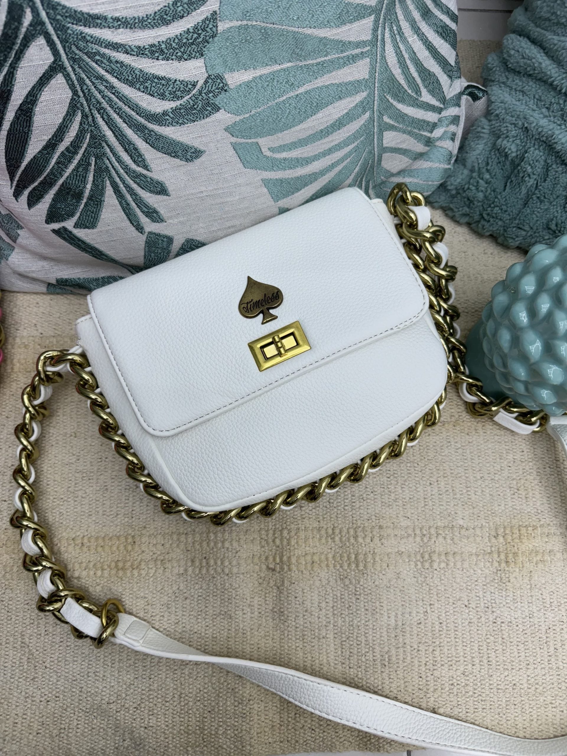 Borsa con catena intorno a losanga