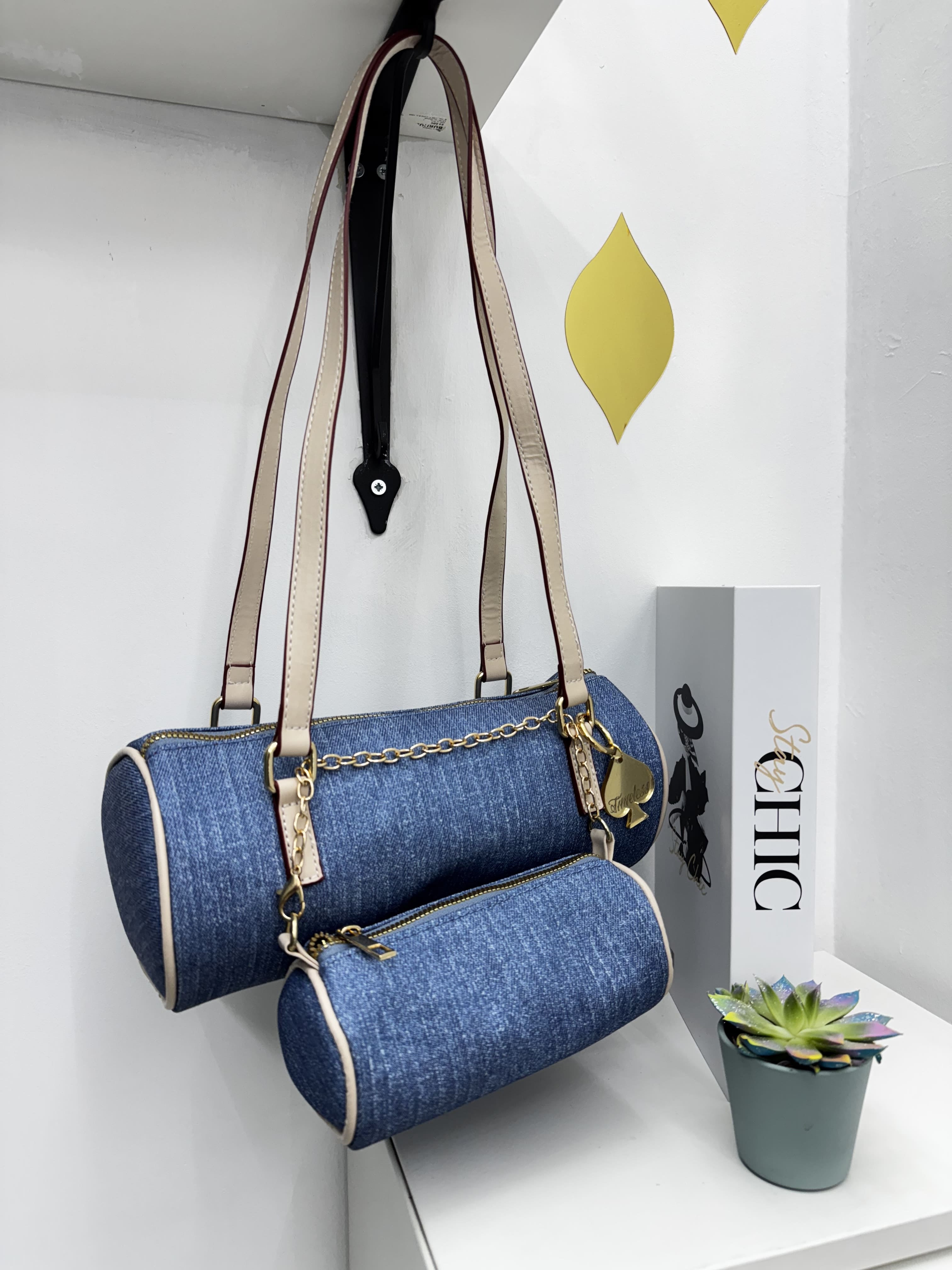 Borsa cilindro in denim con tasca
