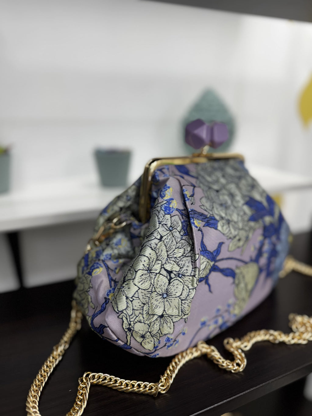 Borsa clutch in tessuto jacquard con fiori