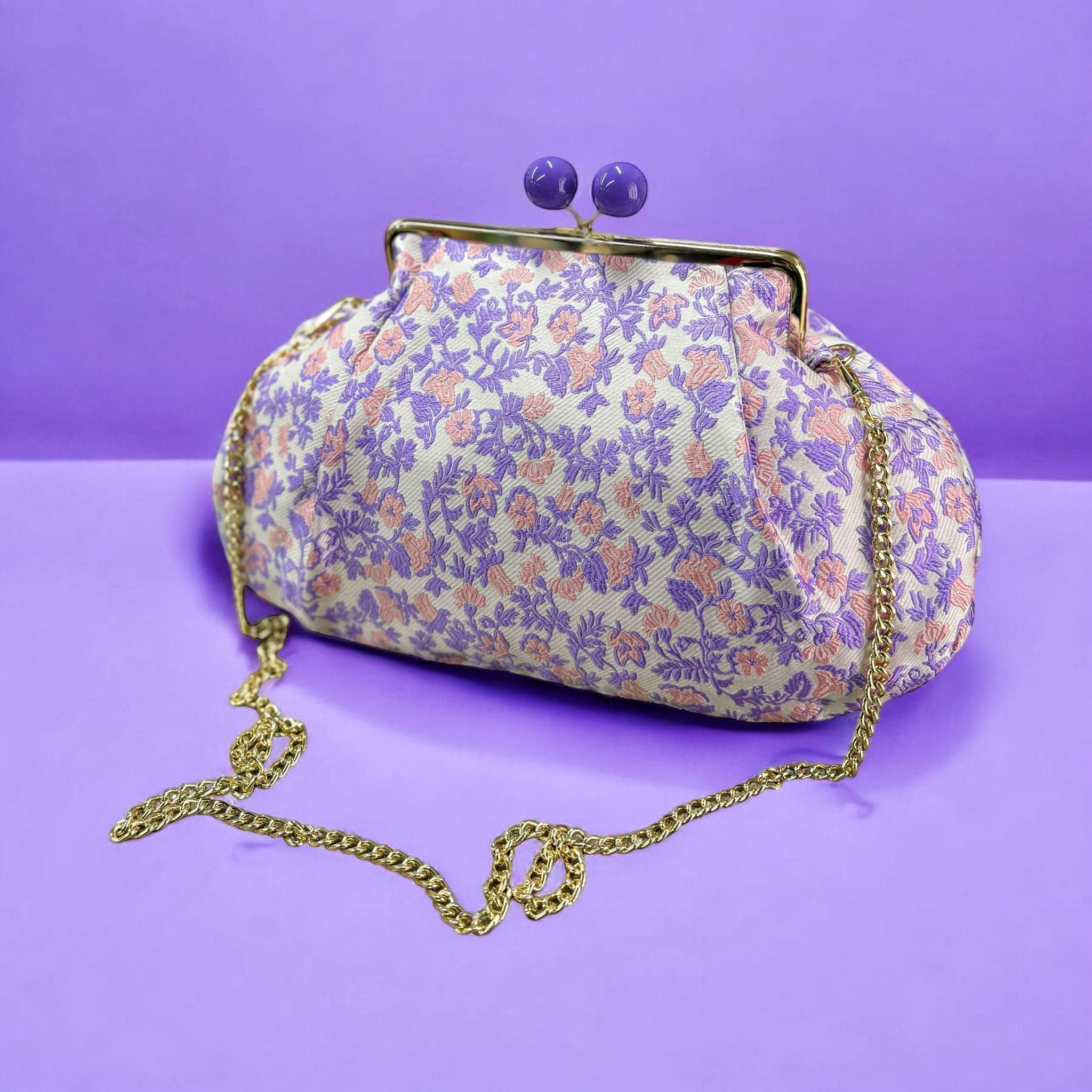 Borsa clutch in tessuto jacquard
