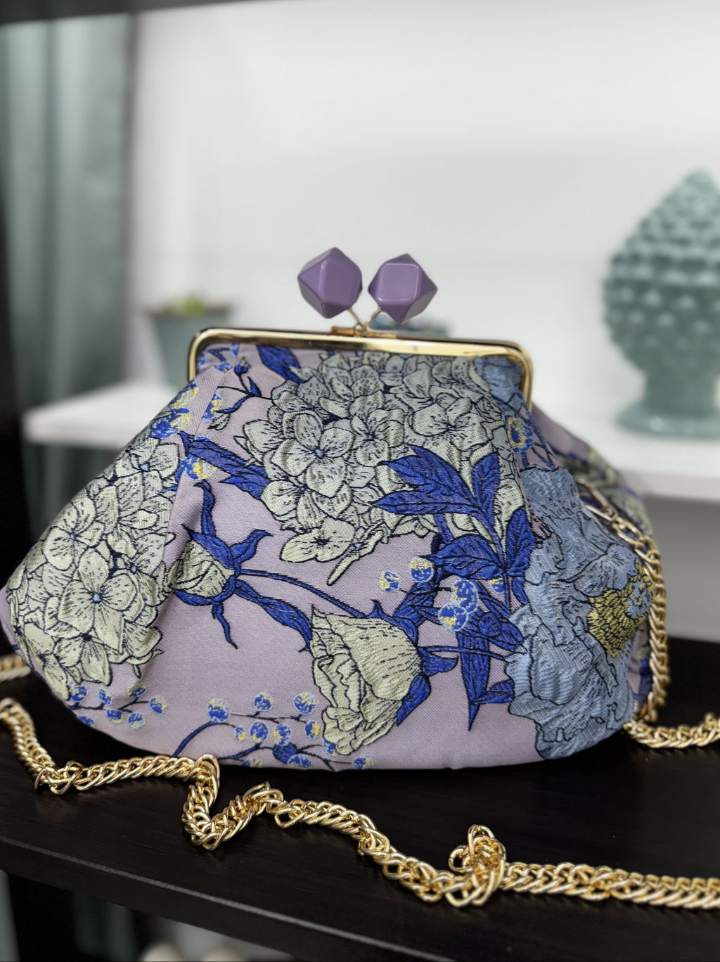 Borsa clutch in tessuto jacquard con fiori