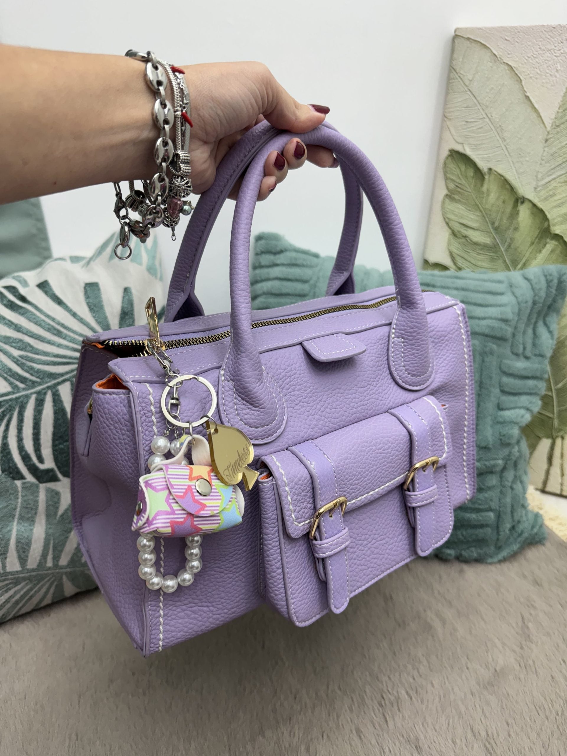 Borsa a mano con la tasca davanti