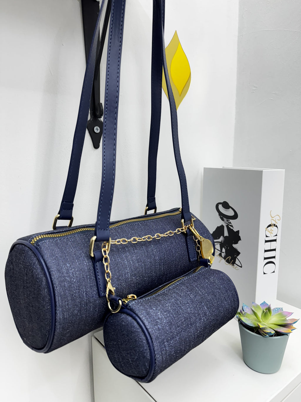 Borsa cilindro in denim con tasca