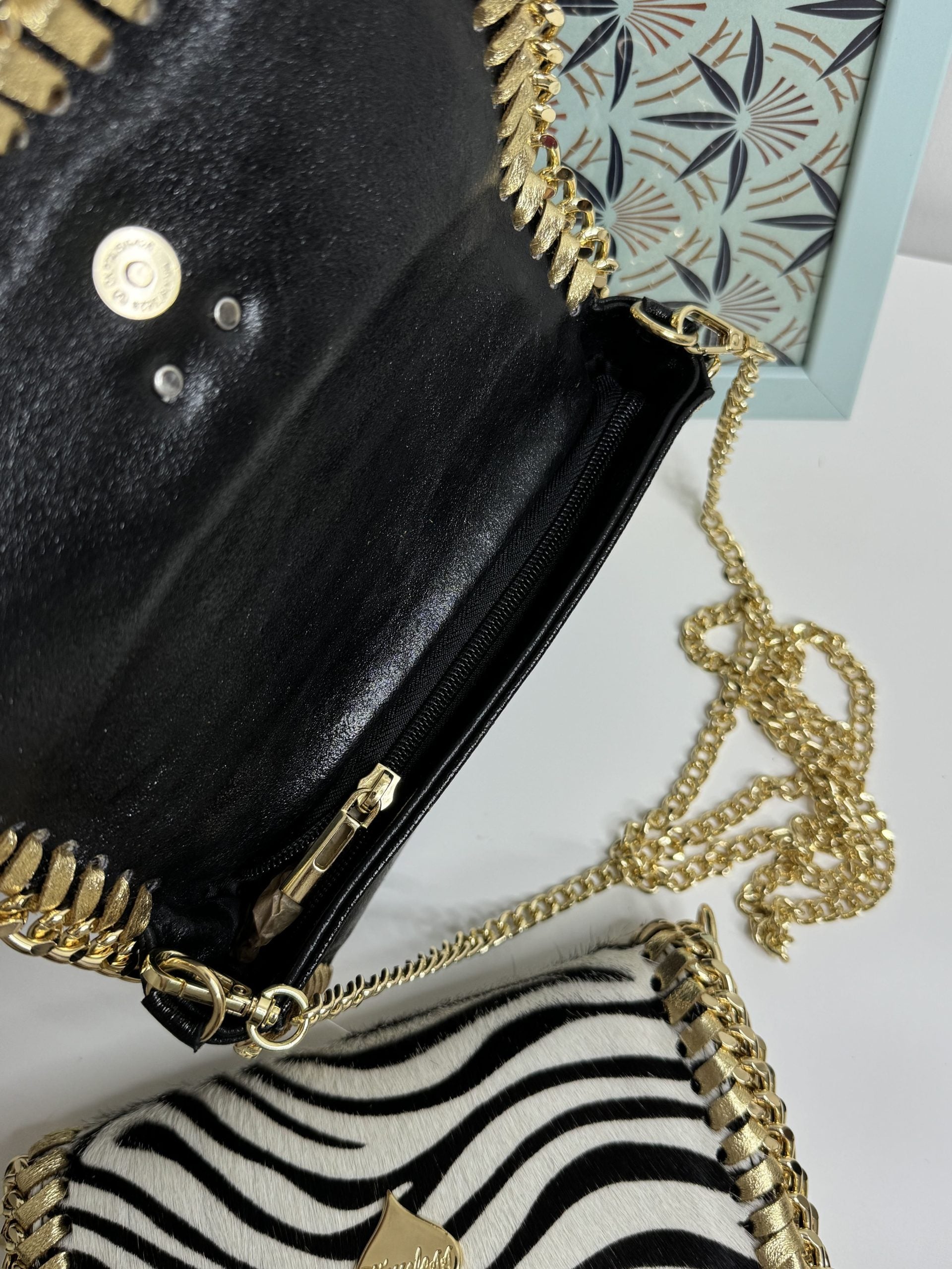Borsa con patta in cavallino animalier