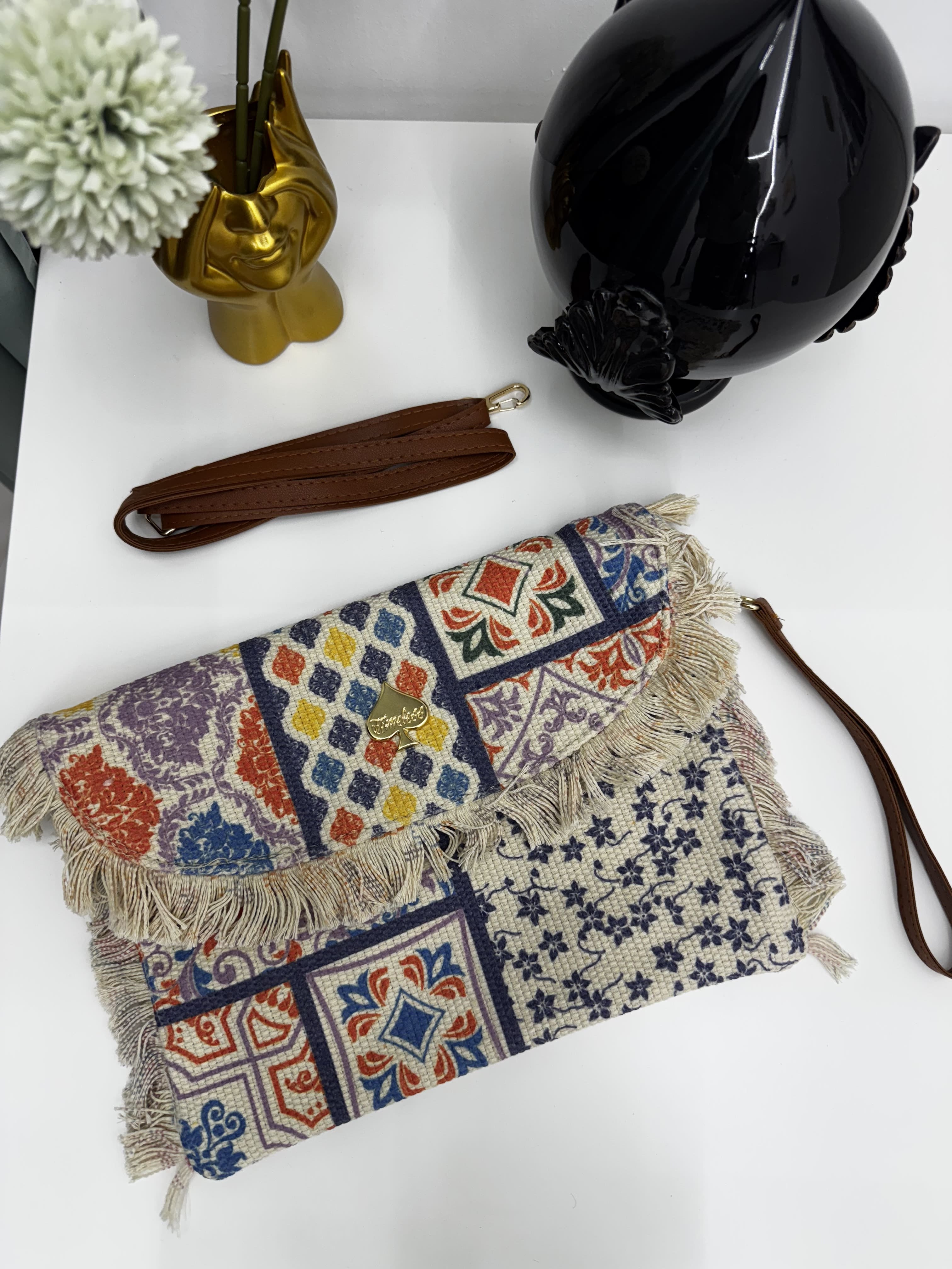 Borsa pochette in stoffa con fantasie multicolor