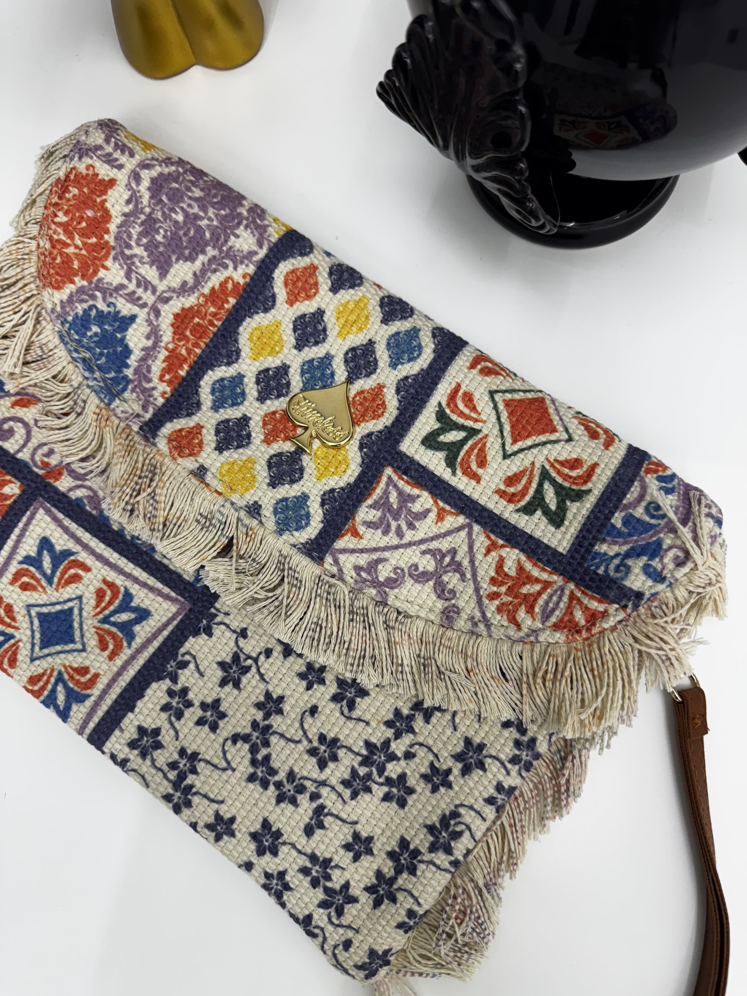 Borsa pochette in stoffa con fantasie multicolor