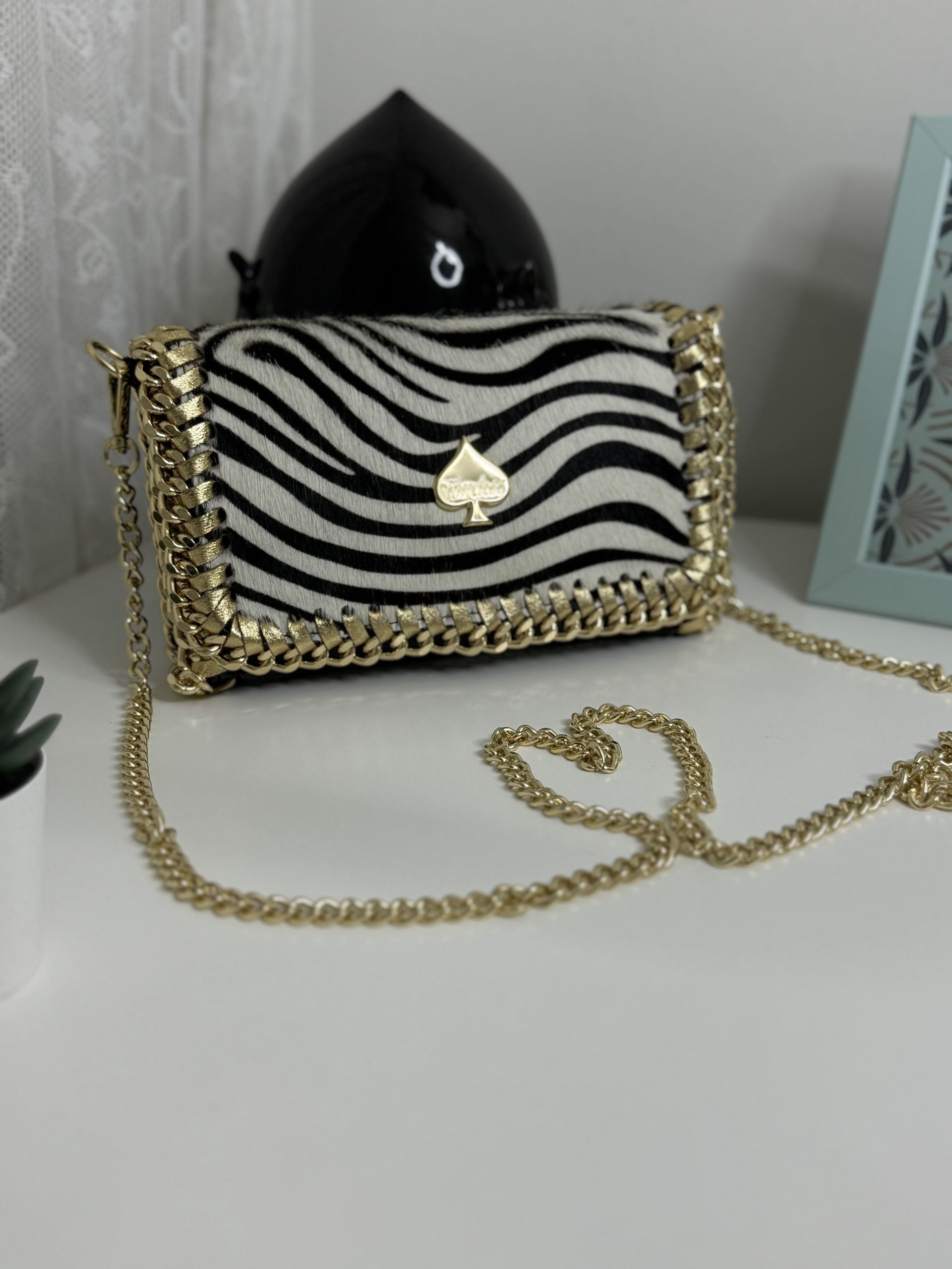 Borsa con patta in cavallino animalier