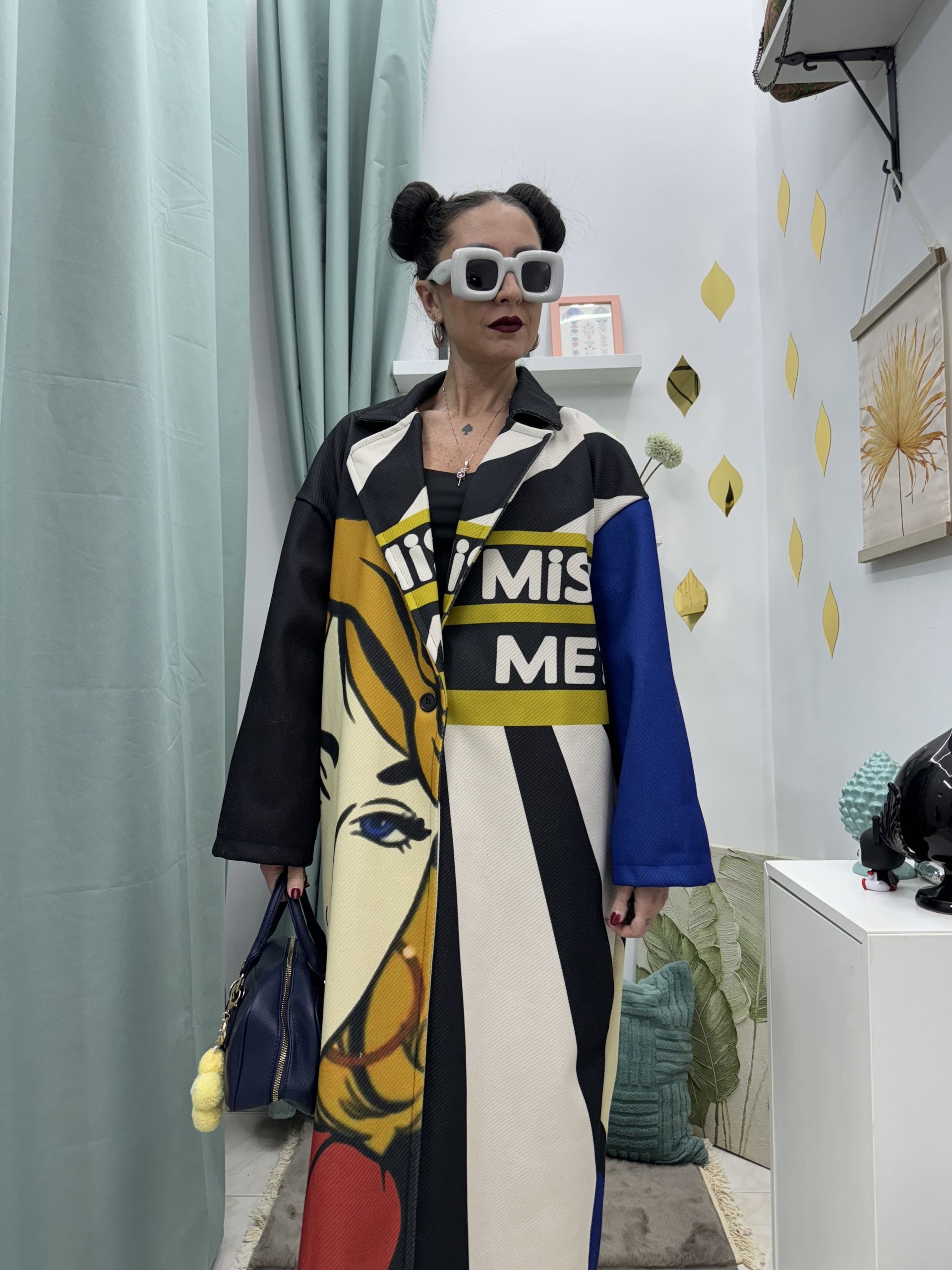 Cappotto lungo in fantasia volto donna