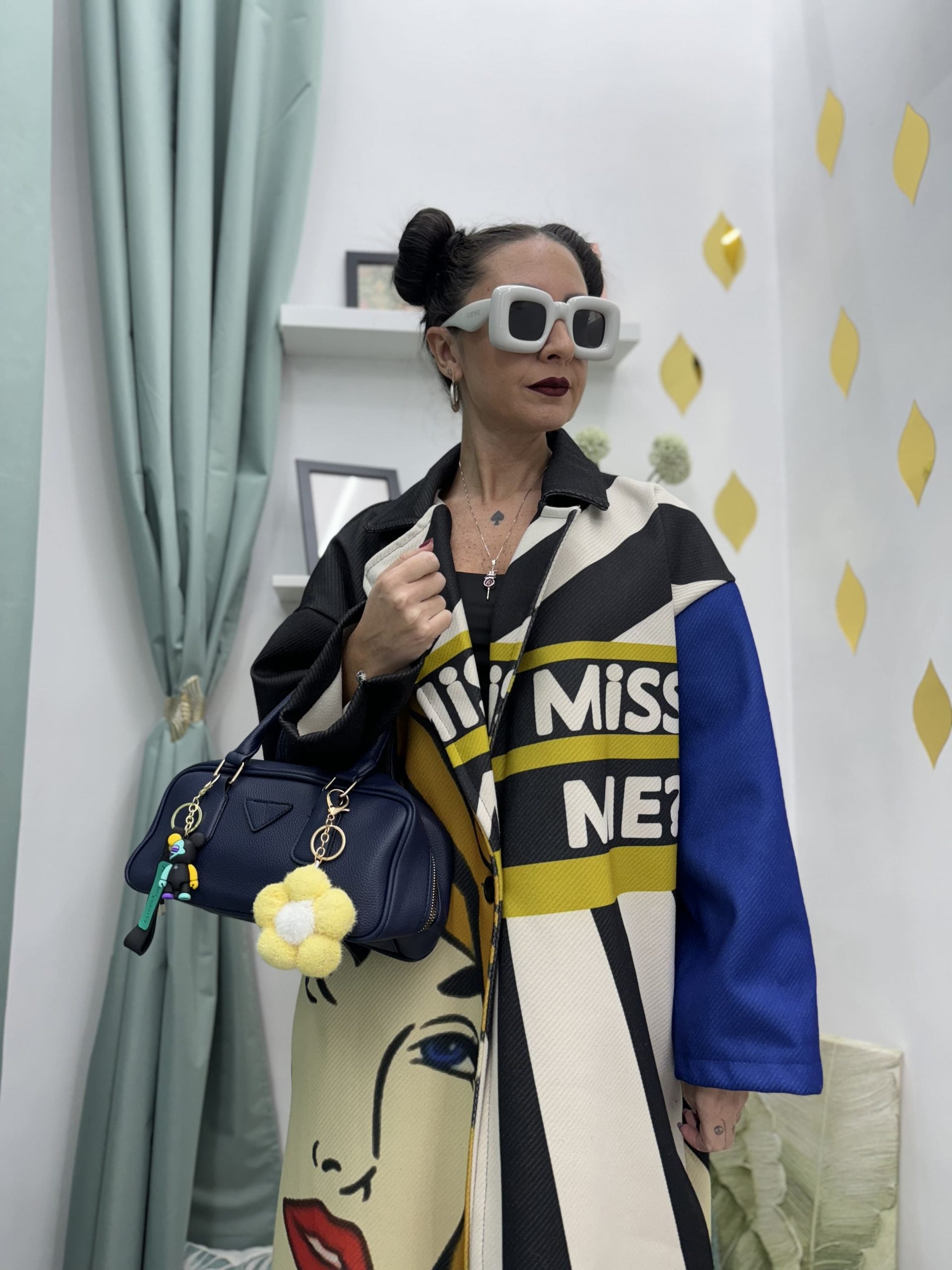 Cappotto lungo in fantasia volto donna