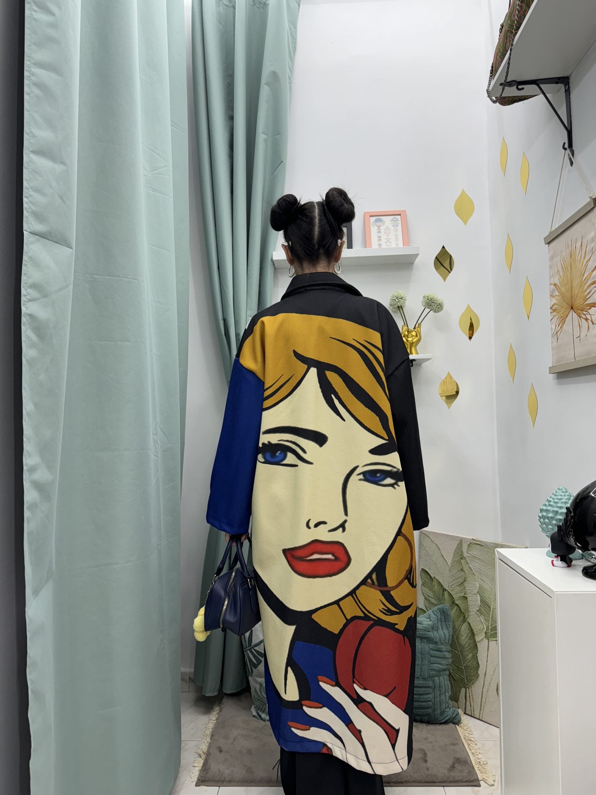 Cappotto lungo in fantasia volto donna