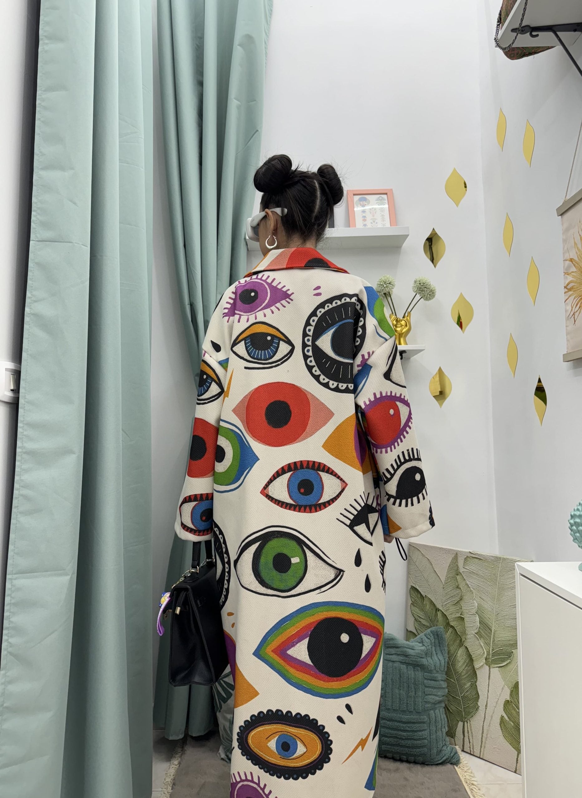 Cappotto lungo in fantasia occhi colorati