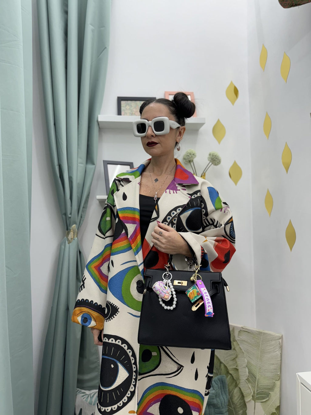 Cappotto lungo in fantasia occhi colorati