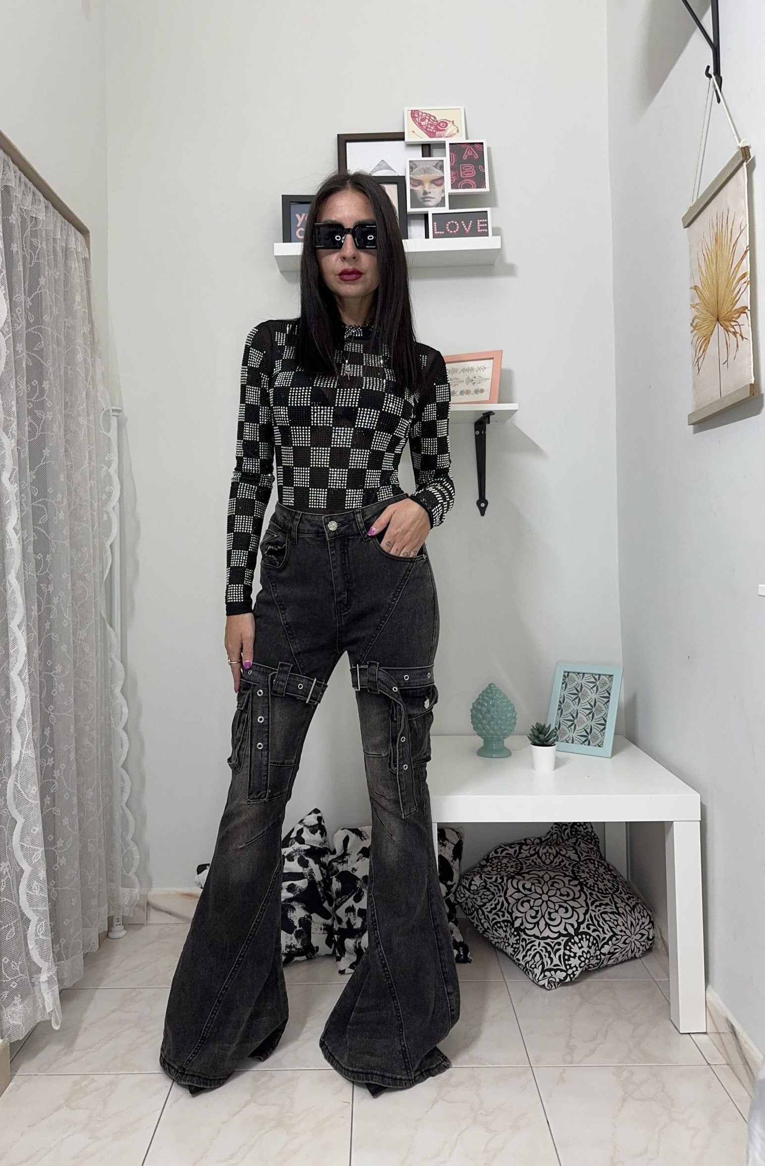 Jeans a zampa in nero slavato