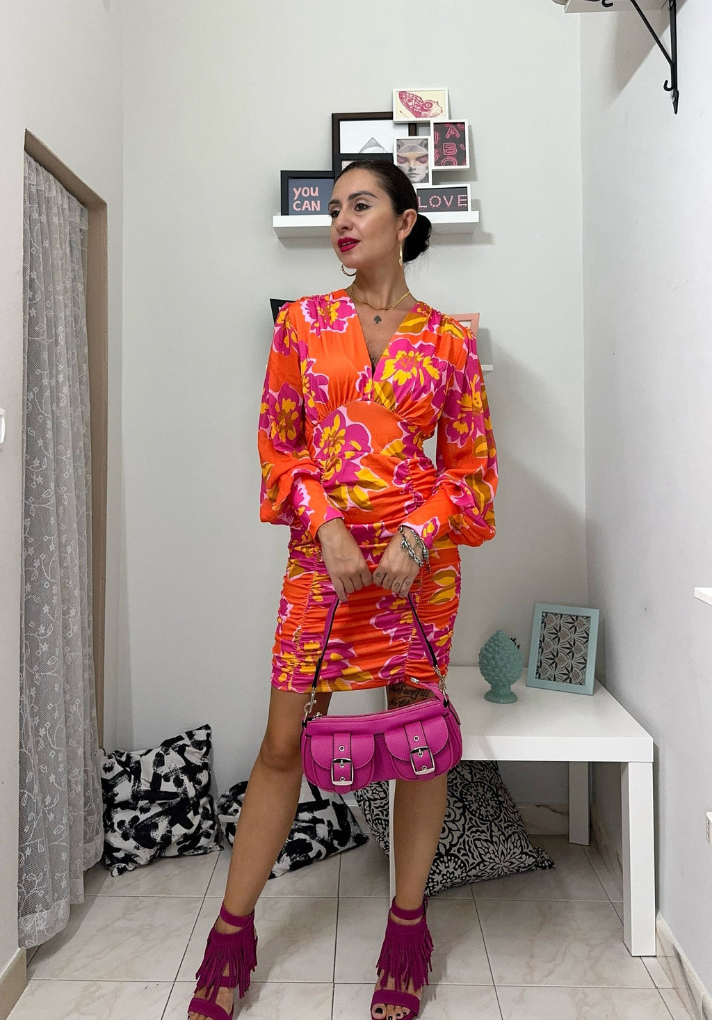 Vestito floreale con drappeggi