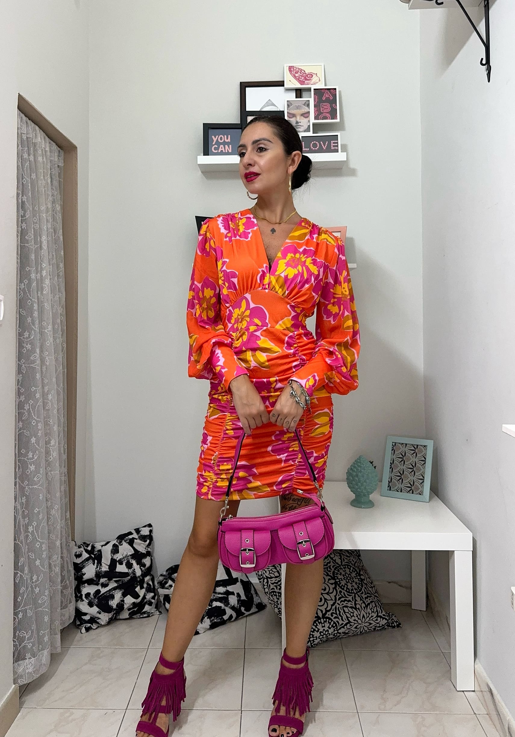 Vestito floreale con drappeggi